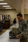 US Army Reserve Sgt. Michael Chamberlain, a psychological operations specialist with the 325th Tactical Psychological Operations Company (Airborne), 2nd Psychological Operations Group, carries an armful of issued equipment at the Fort McCoy, Wis. Central Issue Facility in preparation for training and qualification during Operation Cold Steel, April 03, 2017. The 2nd Psychological Operations Group combines regional and trans-regional expertise, political-military awareness and cross-cultural communication skills to conduct and support civil-military operations for conventional and special operations forces. Operation Cold Steel is the U.S. Army Reserve’s crew-served weapons qualification and validation exercise to ensure that America’s Army Reserve units and Soldiers are trained and ready to deploy on short-notice and bring combat-ready, lethal firepower in support of the Army and our joint partners anywhere in the world. (U.S. Army Reserve photo by Spc. Jeremiah Woods, 358th Public Affairs Detachment / Released)