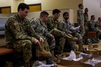 US Army Reserve Soldiers try on cold weather boots prior to issue at the Fort McCoy, Wis. Central Issue Facility in preparation for training and qualification during Operation Cold Steel, April 03, 2017. Operation Cold Steel is the U.S. Army Reserve’s crew-served weapons qualification and validation exercise to ensure that America’s Army Reserve units and Soldiers are trained and ready to deploy on short-notice and bring combat-ready, lethal firepower in support of the Army and our joint partners anywhere in the world. (U.S. Army Reserve photo by Spc. Jeremiah Woods, 358th Public Affairs Detachment / Released)