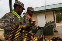 US Army Reserve Spc. Calvin Gray a motor transport operator with the 416th Theater Engineer Command and Pvt. 1st Class Donte Henderson a power generation equipment repairer with the 354th civil affairs company, 351st Civil Affairs Command prep .50 caliber machine gun ammunition to be given to the firing teams during a live fire exercise at Range 26 on Fort McCoy, Wis., for Operation Cold Steel, April 03, 2017. Operation Cold Steel is the U.S. Army Reserve’s crew-served weapons qualification and validation exercise to ensure that America’s Army Reserve units and Soldiers are trained and ready to deploy on short-notice and bring combat-ready, lethal firepower in support of the Army and our joint partners anywhere in the world. (U.S. Army Reserve photo by Spc. Jeremiah Woods, 358th Public Affairs Detachment / Released)
