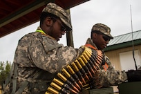 US Army Reserve Spc. Calvin Gray a motor transport operator with the 416th Theater Engineer Command and Pvt. 1st Class Donte Henderson a power generation equipment repairer with the 354th civil affairs company, 351st Civil Affairs Command prep .50 caliber machine gun ammunition to be given to the firing teams during a live fire exercise at Range 26 on Fort McCoy, Wis., for Operation Cold Steel, April 03, 2017. Operation Cold Steel is the U.S. Army Reserve’s crew-served weapons qualification and validation exercise to ensure that America’s Army Reserve units and Soldiers are trained and ready to deploy on short-notice and bring combat-ready, lethal firepower in support of the Army and our joint partners anywhere in the world. (U.S. Army Reserve photo by Spc. Jeremiah Woods, 358th Public Affairs Detachment / Released)