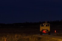 A Light Medium Tactical Vehicle pauses at the first firing position during a night-fire qualification as part of Operation Cold Steel at Fort McCoy, Wis., April 04, 2017. Operation Cold Steel is the U.S. Army Reserve’s crew-served weapons qualification and validation exercise to ensure that America’s Army Reserve units and Soldiers are trained and ready to deploy on short-notice and bring combat-ready, lethal firepower in support of the Army and our joint partners anywhere in the world. (U.S. Army Reserve photo by Spc. Jeremiah Woods, 358th Public Affairs Detachment / Released)