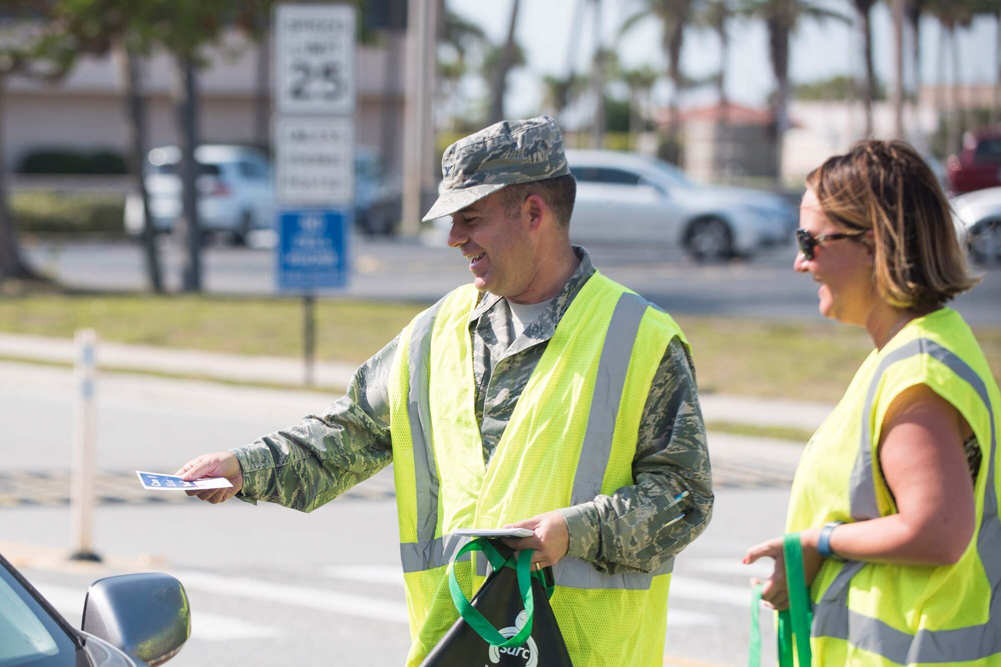 Col. Walt Jackim, 45th Space Wing vice commander, and Laura Tasker, 45th Space Wing sexual assault response coordinator, provide sexual assault prevention resources to members at Patrick Air Force Base, Fla., April 5, 2017.  Sexual assault can severely impact the 45th Space Wing’s mission readiness, is not tolerated and does not adhere to Air Force Core Values. (U.S. Air Force photo by Phil Sunkel) 