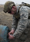 Senior Airman Adam Allen, 5th Civil Engineer Squadron explosive ordnance disposal team leader, removes an inert unexploded ordnance tail fuse at Minot Air Force Base, N.D., March 28, 2017. UXO recovery operations is one of the 10 mission-areas executed by EOD Airmen. (U.S. Air Force photo/Airman 1st Class Alyssa M. Akers)