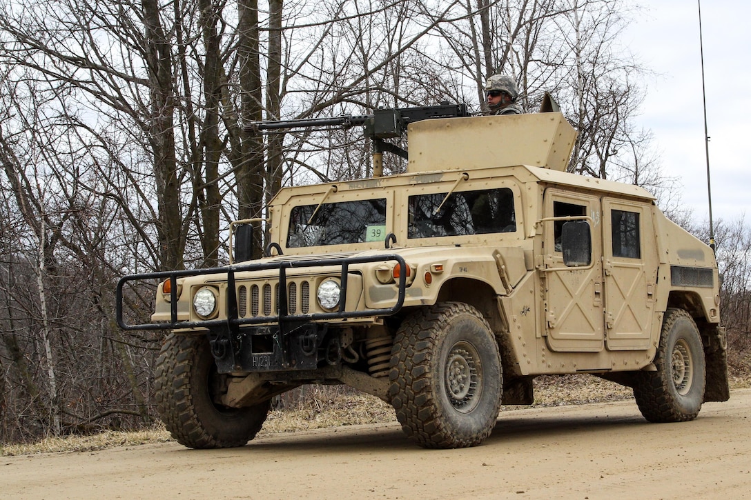 Army Reserve Soldiers from the 430th Quartermaster Company, based out of Fort Buchanan, Puerto Rico, return from a firing exercise as part of Operation Cold Steel at Fort McCoy, Wis., on March 31, 2017. The company is assigned to the 1st MSC, based out of Fort Buchanan, Puerto Rico, which provides mission command to assigned units of the Army Reserve in Puerto Rico and the U.S. Virgin Islands to ensure unit readiness to deploy to war and successfully execute their wartime missions. Operation Cold Steel is the U.S. Army Reserve’s crew-served weapons qualification and validation exercise to ensure that America’s Army Reserve units and Soldiers are trained and ready to deploy on short-notice and bring combat-ready, lethal firepower in support of the Army and our joint partners anywhere in the world. (U.S. Army Reserve photo by Spc. Jeremiah Woods, 358th Public Affairs Detachment / Released)