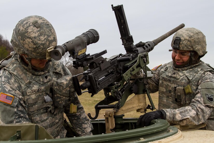 US Army Reserve Spc. Isaac Talley, a chemical, biological, radiological and nuclear specialist and US Army Sgt. Gregory Crespin a wheeled vehicle mechanic, both with the 277th Quartermaster Company, 76th Operational Response Command, inspect an M2 .50 caliber machine gun in preparation for qualification as part Operation Cold Steel at Fort McCoy, Wis., April 2, 2017. The 76th ORC is the Army Reserve’s center for Defense Support of Civil Authorities, coordinating support to state and local officials, first responders and other federal agencies during emergencies or natural disasters. Operation Cold Steel is the U.S. Army Reserve’s crew-served weapons qualification and validation exercise to ensure that America’s Army Reserve units and Soldiers are trained and ready to deploy on short-notice and bring combat-ready, lethal firepower in support of the Army and our joint partners anywhere in the world. (U.S. Army Reserve photo by Spc. Jeremiah Woods, 358th Public Affairs Detachment / Released)