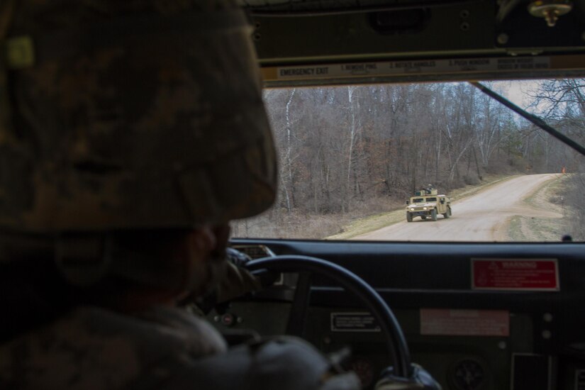 US Army Spc. Jessica Taylor, a civil affairs specialist with the 364th Civil Affairs Brigade, 351st Civil Affairs Command, maneuvers a Humvee during a firing exercise as part of Operation Cold Steel at Fort McCoy, Wis., on April 02, 2017. The 351st CACOM is responsible for strategic operations through tactical civil affairs support across the U.S. Pacific Command area of responsibility. Operation Cold Steel is the U.S. Army Reserve’s crew-served weapons qualification and validation exercise to ensure that America’s Army Reserve units and Soldiers are trained and ready to deploy on short-notice and bring combat-ready, lethal firepower in support of the Army and our joint partners anywhere in the world. (U.S. Army Reserve photo by Spc. Jeremiah Woods, 358th Public Affairs Detachment / Released)