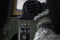 US Army Spc. Jessica Taylor, a civil affairs specialist with the 364th Civil Affairs Brigade, 351st Civil Affairs Command, maneuvers a Humvee during a firing exercise as part of Operation Cold Steel at Fort McCoy, Wis., on April 02, 2017. The 351st CACOM is responsible for strategic operations through tactical civil affairs support across the U.S. Pacific Command area of responsibility. Operation Cold Steel is the U.S. Army Reserve’s crew-served weapons qualification and validation exercise to ensure that America’s Army Reserve units and Soldiers are trained and ready to deploy on short-notice and bring combat-ready, lethal firepower in support of the Army and our joint partners anywhere in the world. (U.S. Army Reserve photo by Spc. Jeremiah Woods, 358th Public Affairs Detachment / Released)