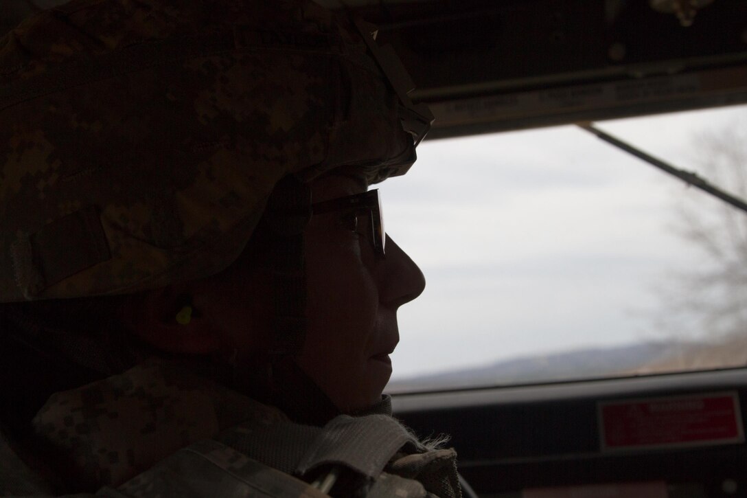 US Army Spc. Jessica Taylor, a civil affairs specialist with the 364th Civil Affairs Brigade, 351st Civil Affairs Command, maneuvers a Humvee during a firing exercise as part of Operation Cold Steel at Fort McCoy, Wis., on April 02, 2017. The 351st CACOM is responsible for strategic operations through tactical civil affairs support across the U.S. Pacific Command area of responsibility. Operation Cold Steel is the U.S. Army Reserve’s crew-served weapons qualification and validation exercise to ensure that America’s Army Reserve units and Soldiers are trained and ready to deploy on short-notice and bring combat-ready, lethal firepower in support of the Army and our joint partners anywhere in the world. (U.S. Army Reserve photo by Spc. Jeremiah Woods, 358th Public Affairs Detachment / Released)