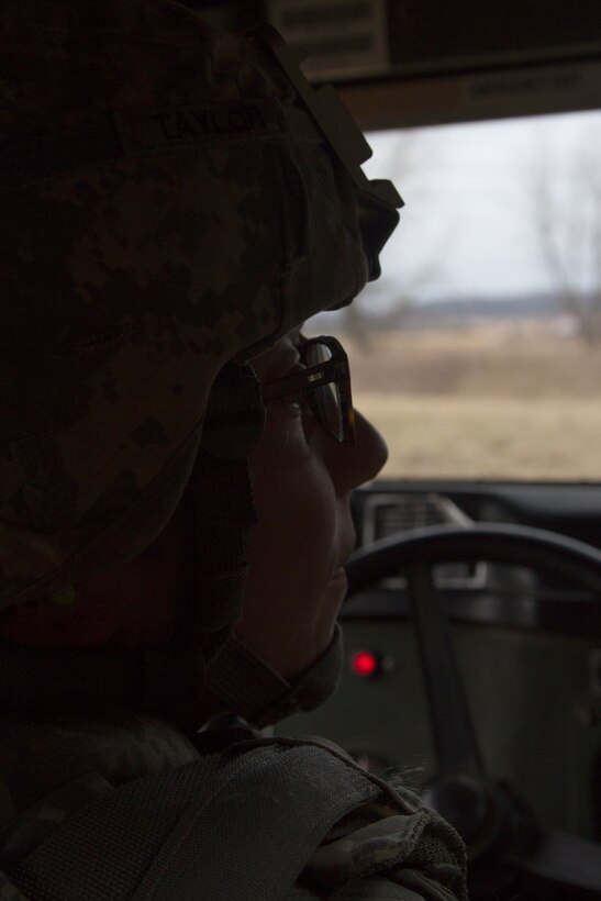 US Army Spc. Jessica Taylor, a civil affairs specialist with the 364th Civil Affairs Brigade, 351st Civil Affairs Command, maneuvers a Humvee during a firing exercise as part of Operation Cold Steel at Fort McCoy, Wis., on April 02, 2017. The 351st CACOM is responsible for strategic operations through tactical civil affairs support across the U.S. Pacific Command area of responsibility. Operation Cold Steel is the U.S. Army Reserve’s crew-served weapons qualification and validation exercise to ensure that America’s Army Reserve units and Soldiers are trained and ready to deploy on short-notice and bring combat-ready, lethal firepower in support of the Army and our joint partners anywhere in the world. (U.S. Army Reserve photo by Spc. Jeremiah Woods, 358th Public Affairs Detachment / Released)