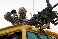 US Army Reserve Spc. Adam Paquet, a petroleum and supply specialist with the 277th Quartermaster Company, 377th Theater Sustainment Command, lifts rounds for a MK19 grenade launcher in preparation for qualification as part Operation Cold Steel at Fort McCoy, Wis., April 2, 2017. The 377th TSC is aligned with U.S. Southern Command, which oversees U.S. military interests in Latin America and the Caribbean. Operation Cold Steel is the U.S. Army Reserve’s crew-served weapons qualification and validation exercise to ensure that America’s Army Reserve units and Soldiers are trained and ready to deploy on short-notice and bring combat-ready, lethal firepower in support of the Army and our joint partners anywhere in the world. (U.S. Army Reserve photo by Spc. Jeremiah Woods, 358th Public Affairs Detachment / Released)