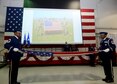 Members of the 94th Airlift Honor Guard perform a flag folding ceremony during a retirement ceremony on Dobbins Air Reserve Base, Ga., April 2, 2017, honoring a successful 33 year career of Chief Master Sgt Lyndon Tubbs, 94th Airlift Wing command chief. (U.S. Air Force photo/Don Peek)