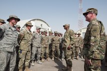 U.S. Air Force Vice Chief of Staff Gen. Stephen Wilson (right) and Chief Master Sgt. of the Air Force Kaleth O. Wright (center) speak with Airmen assigned to the 407th Expeditionary Civil Engineer Squadron at the 407th Air Expeditionary Group April 8, 2017. The two leaders visited several bases in Central Command’s area of operations to talk to deployed Airmen about the missions they are performing.  (U.S. Air Force photo/Master Sgt. Benjamin Wilson)(Released)