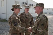 U.S. Air Force Vice Chief of Staff Gen. Stephen Wilson (left) is introduced to Senior Airmen Anastasia Hertter, 407th Expeditionary Operations Support Squadron administrator, (right) by Lt. Col. Nora Nelson, 407th Air Expeditionary Group deputy commander, during the general’s visit to the 407th AEG April 8, 2017. During the visit the general thanked Airmen for what they are doing while deployed and answered questions about Air Force policies and plans. (U.S. Air Force photo/Master Sgt. Benjamin Wilson)(Released)