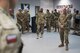 U.S. Air Force Vice Chief of Staff Gen. Stephen Wilson (right) and Chief Master Sgt. of the Air Force Kaleth O. Wright (center) speak with a Polish Airmen assigned to the 407th Expeditionary Security Forces Squadron during their visit to the 407th Air Expeditionary Group April 8, 2017. Both Polish Airmen and U.S. Marines are integrated into the squadron to enhance the defense of joint and coalition assets on the installation. (U.S. Air Force photo/Master Sgt. Benjamin Wilson)(Released)