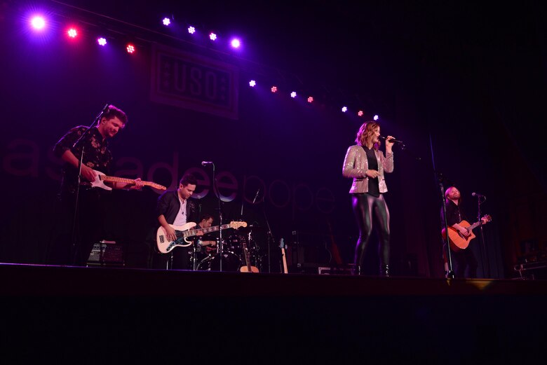 Cassadee Pope and her band perform during a USO-sponsored concert April 8, 2017, at the Ernie Walker Theater on Eielson Air Force Base, Alaska. Pope performed for the Icemen Team and their families for free in her very first USO concert. (U.S. Air Force photo by Airman 1st Class Cassandra Whitman)
