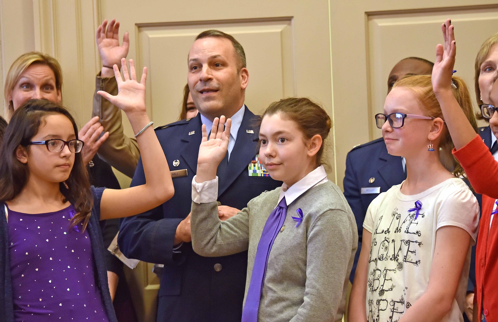 Col. Doug Hall, 436th Operations Group commander, and the Dover Air Force Base Middle School Chorus gather in support of military children April 4, 2017, at Legislative Hall in Dover, Del. Hall spoke to the Delaware General Assembly on the history and the meaningful support that goes to military families. (Courtesy photo/David Chambers)