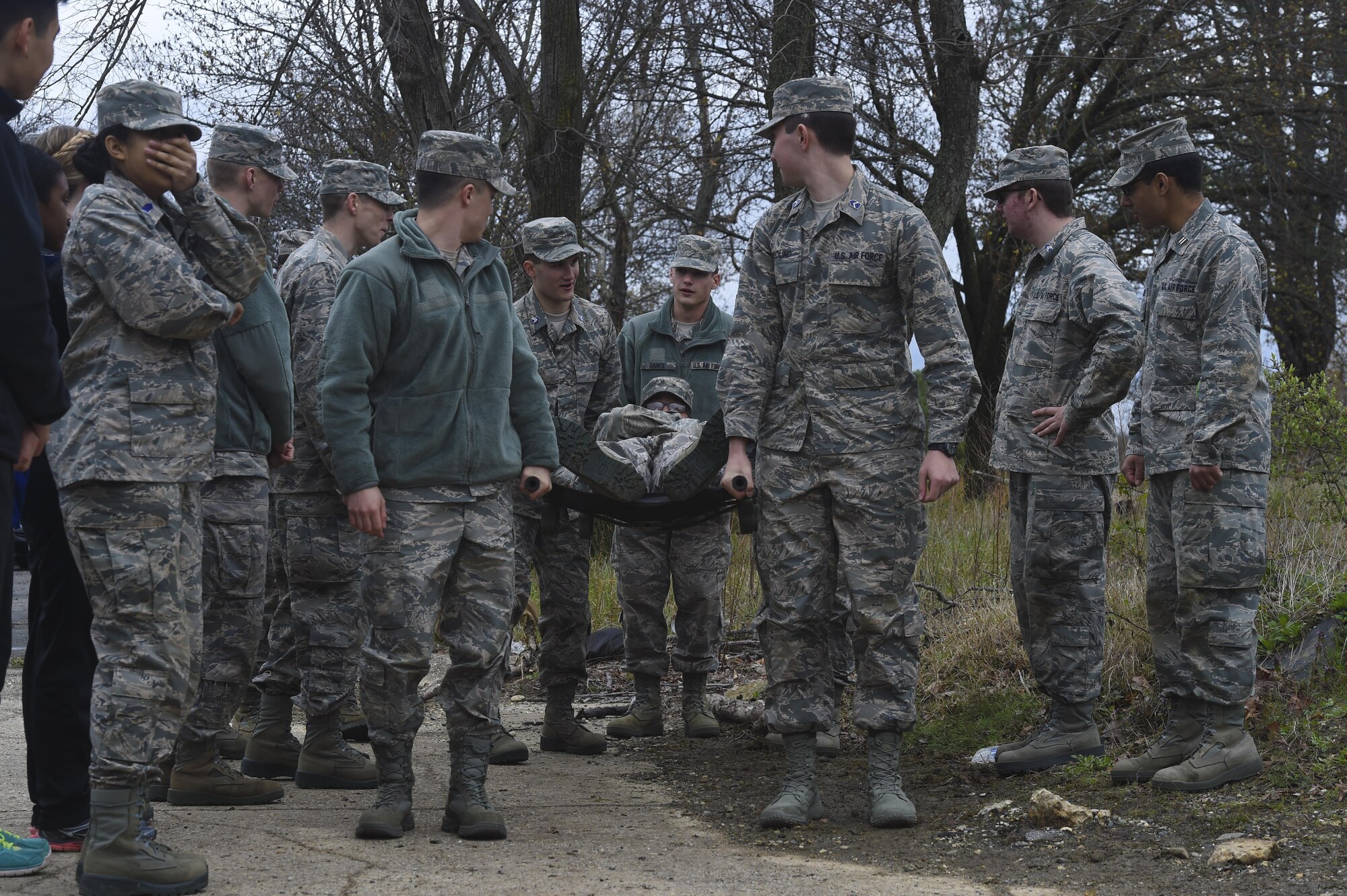 University of Maryland ROTC students look to each other for guidance while practicing a litter carry during training at Joint Base Andrews, Md., April 1, 2017. Approximately 120 students attended the training, led by the 11th Security Force Squadron. (U.S. Air Force photo by Senior Airman Mariah Haddenham)