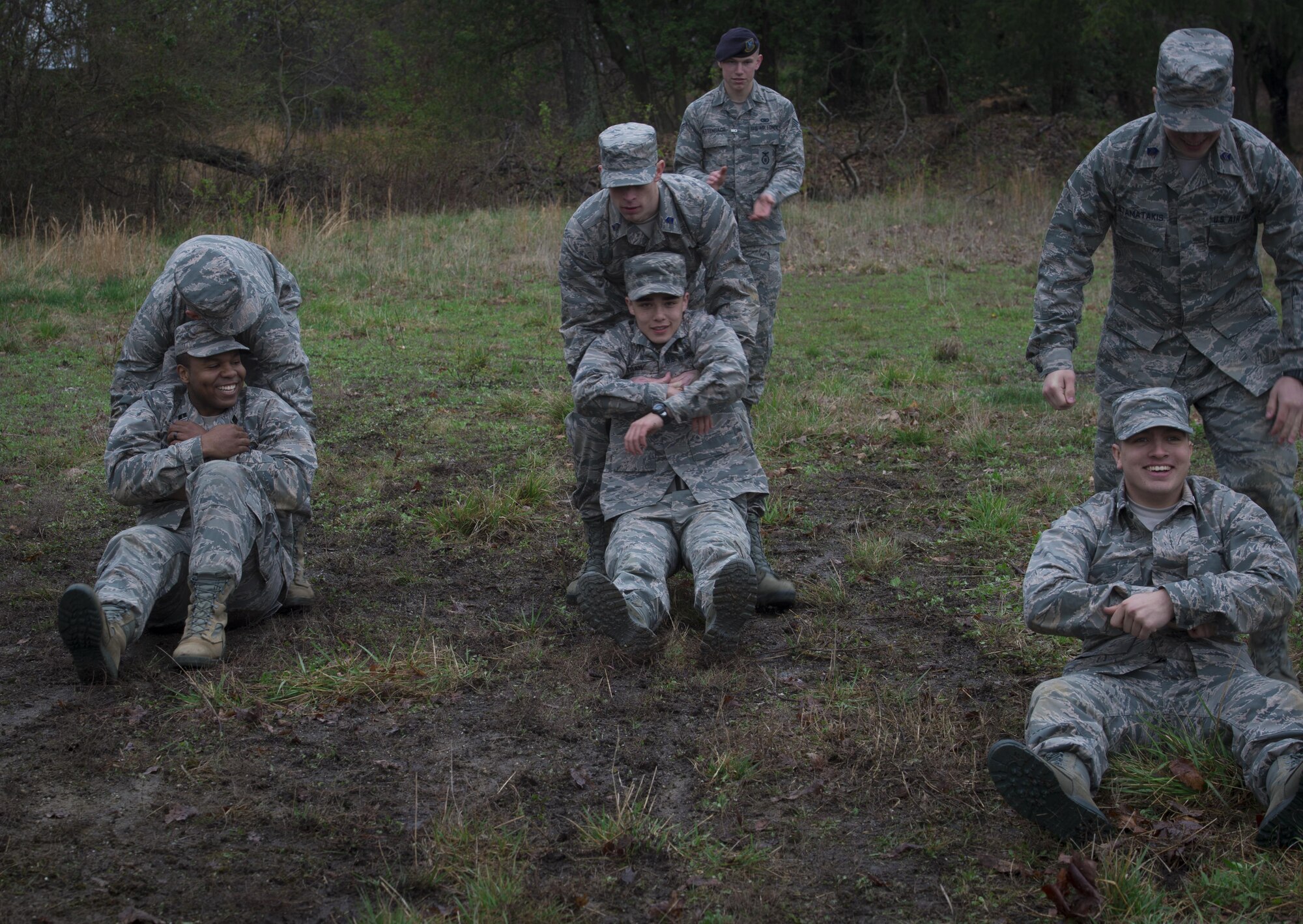 Senior Airman Gregory Hettenbach (back), 11th Security Forces Squadron emergency services team responder, supervises University of Maryland ROTC students during training at Joint Base Andrews, Md., April 1, 2017. The students practiced entry control point challenging and procedures, combat medical readiness, tactical movements, and land navigation. (U.S. Air Force photo by Senior Airman Mariah Haddenham)