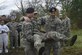Senior Airman Gregory Hettenbach (right), 11th Security Forces Squadron emergency services team responder, and Senior Airman Nicholas Tyburczy (left), 11th SFS EST responder, instruct University of Maryland ROTC students on how to perform a firemen’s carry during training at Joint Base Andrews, Md., April 1, 2017. Approximately 120 students attended the training, led by the 11th SFS. (U.S. Air Force photo by Senior Airman Mariah Haddenham) 