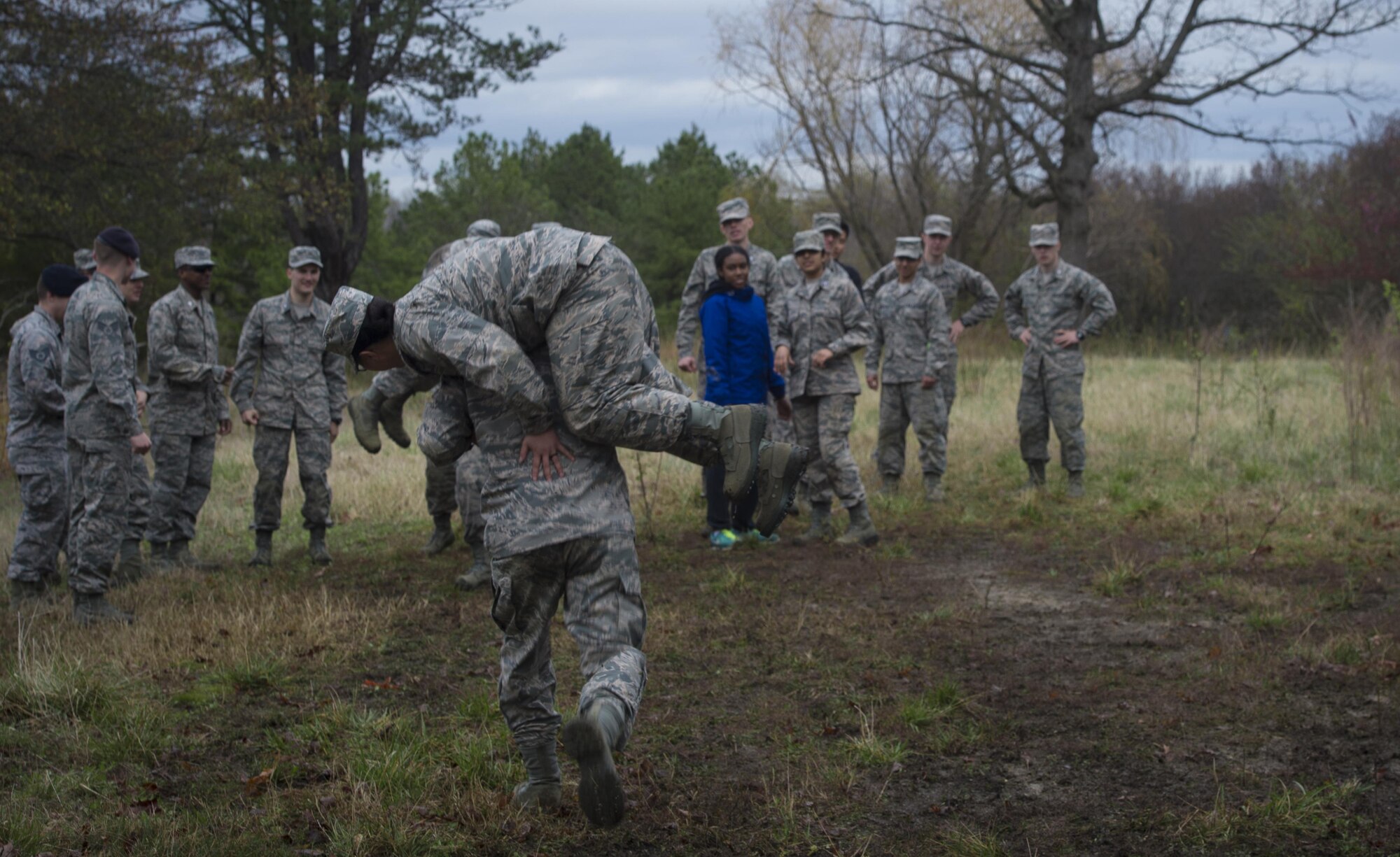 University of Maryland ROTC students practice carrying their classmates during training at Joint Base Andrews, Md., April 1, 2017. The students practiced entry control point challenging and procedures, combat medical readiness, tactical movements, and land navigation. The training was led by 11th Security Forces Squadron Airmen. (U.S. Air Force photo by Senior Airman Mariah Haddenham)