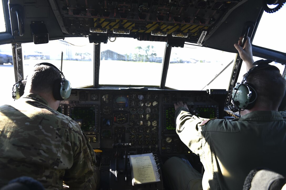 Master Sgts. Gregory Dedicke, left, and Clayton Slater, special missions aviators with the 15th Special Operations Squadron, conduct pre-flight checks in an MC-130 Combat Talon II at Hurlburt Field, Fla., April 7, 2017. Pre-flight inspections are accomplished to check for any issues that may interfere with the flight mission and ensure aircraft are ready to execute operations. (U.S. Air Force photo by Airman 1st Class Joseph Pick)