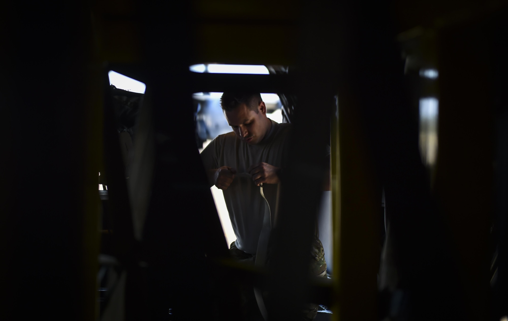 Staff Sgt. Tim Barnes, a loadmaster with the 15th Special Operations Squadron, secures pallets on an MC-130 Combat Talon II at Hurlburt Field, Fla., April 7, 2017. Loadmasters are responsible for properly loading, securing and escorting cargo and passengers before and during flights. (U.S. Air Force photo by Airman 1st Class Joseph Pick)