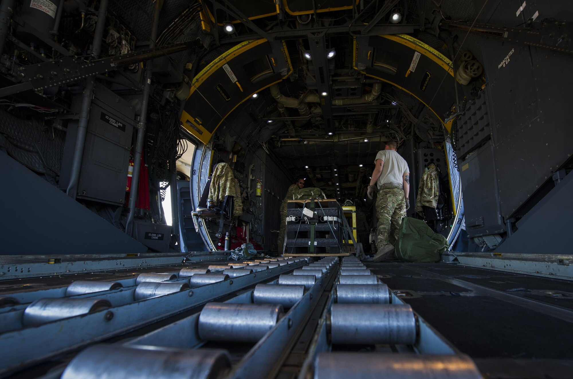 Loadmasters with the 15th Special Operations Squadron transport a container delivery system onto an MC-130 Combat Talon II at Hurlburt Field, Fla., April 7, 2017. The container delivery system is the most commonly used method for the quick, aerial insertion of supplies for military operations ensuring global reach anytime, anyplace. (U.S. Air Force photo by Airman 1st Class Joseph Pick)