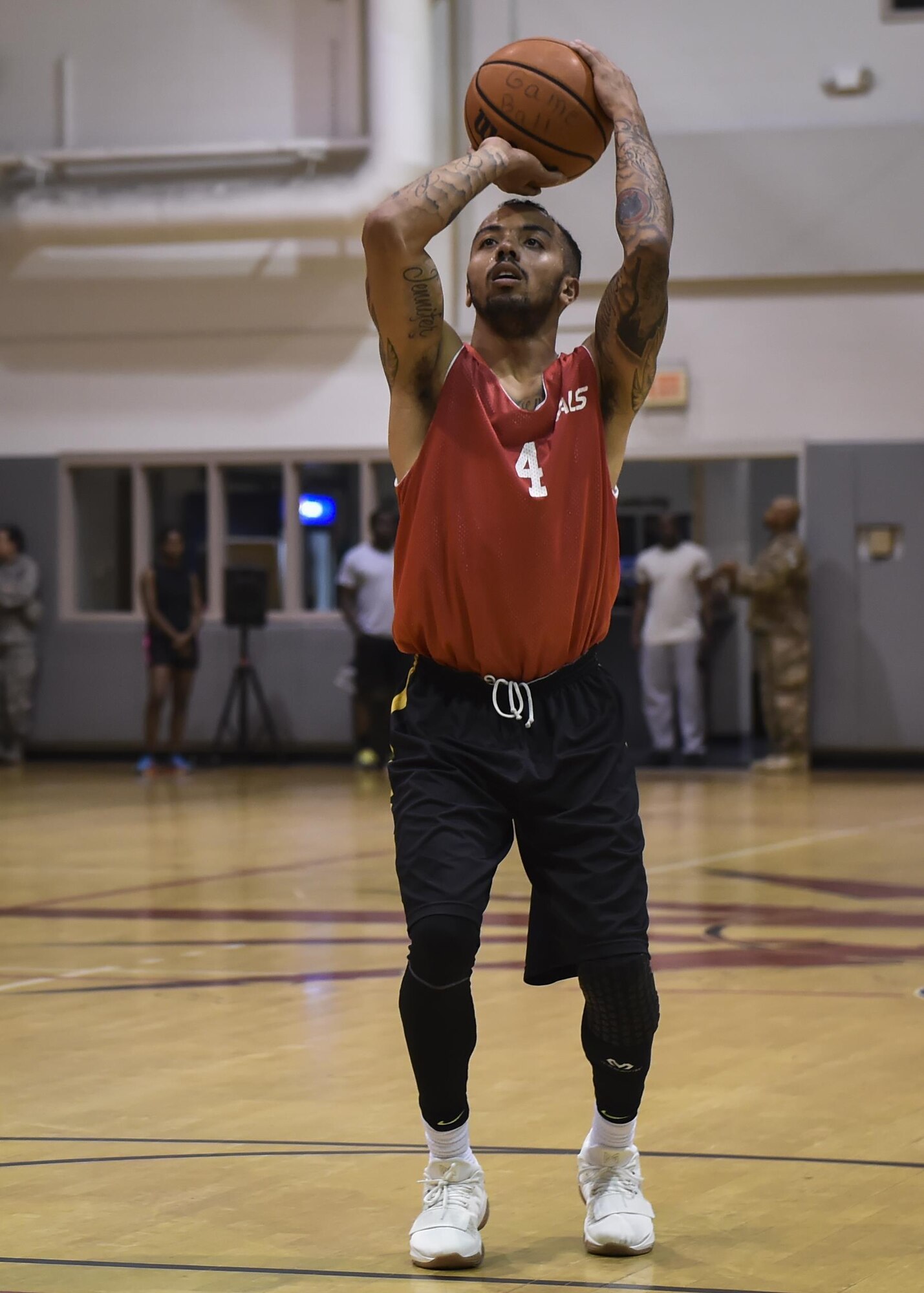 Lonnie Perrin, a member of the 1st Special Operations Medical Group basketball team, shoots a free throw during the intramural basketball championship at the Aderholt Fitness Center on Hurlburt Field, Fla., April 6, 2017. For eight weeks, 12 teams competing through a single-elimination tournament to qualify for the championship game. (U.S. Air Force photo by Airman 1st Class Joseph Pick)
