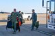 Col. Brent Weisner, 93rd Bomb Squadron commander and Barry Regula, 93rd BS honorary commander, depart the bus for their flight April 7, 2016 on the flight line of Barksdale Air Force Base, La. The Honorary Commanders Program pairs squadron commanders with local civic leaders to increase public awareness and understanding of the Air Force Reserve and its mission. (U.S. Air Force photo by Master Sgt. Dachelle Melville/Released)