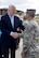 Sen. John Cornyn III, Senate Majority Whip for the 115th Congress, meets U.S. Air Force Tech. Sgt. Aaron Dvorak, 315th Training Squadron geospatial intelligence analysis course chief, before his press conference at the RQ-1 Predator aircraft display on Goodfellow Air Force Base, Texas, April 10, 2017. Dvorak explained to Cornyn how Goodfellow trains intelligence analysts here and how our training ties to the aircraft. (U.S. Air Force photo by Staff Sgt. Joshua Edwards/Released)