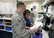 Members of the Altus Air Force Base pharmacy prepare a cold medication pack, April 10, 2017, at Altus Air Force Base, Oklahoma. The base pharmacy offers cold medication packs to those who meet their qualifications to help cut down on patient and health care provider’s time and money. (U.S. Air Force Photo by Airman 1st Class Jackson N. Haddon/Released).