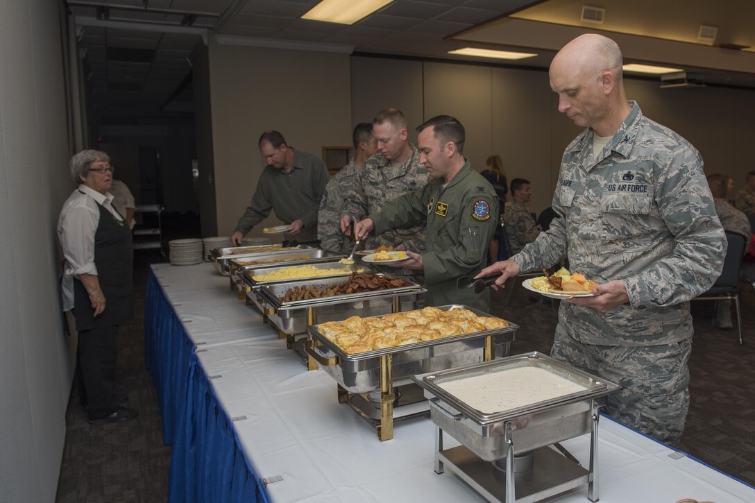 Col. Timothy Gillaspie, 82nd Training Wing vice commander, leads Sheppard Air Force Base, Texas, leadership through the breakfast line at the Annual Air Force Assistance Fund kickoff breakfast, April 10, 2017. The contributions made to the AFAF Campaign help Airmen, families and retirees by providing services such as support for emergency needs, educational assistance and family support to include comfort to Air Force widows. (U.S. Air Force photo by Staff Sgt. Kyle E. Gese)