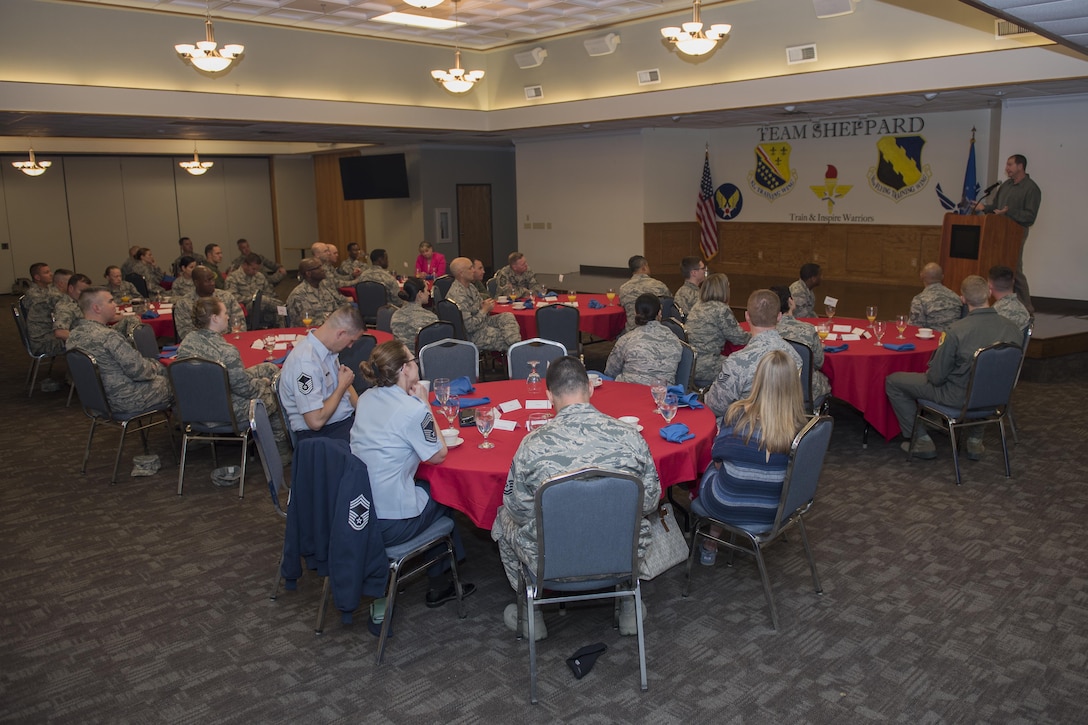 Airmen from Sheppard Air Force Base, Texas, listen to Michael Brown from the Airman and Family Readiness Center share his story about how he has seen the Air Force Assistance Fund impact the lives of fellow wingmen, April 10, 2017. The AFAF will run until May 19, 2017, which supports four affiliate charities: Air Force Aid Society, Air Force Villages Charitable Foundation, Lemay Foundation and the Air Force Enlisted Village. (U.S. Air Force photo by Staff Sgt. Kyle E. Gese)