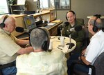 Col. Thomas K. Smith, Jr., 433rd Airlift Wing commander, speaks with John Thurman, Heart of Texas Realty, Bjorn Dybdahl, Bjorns Audio Video, and Klaus Weiswurm, Innovation Technology Machinery, on the San Antonio's Movers and Shakers radio program April 8, 2017 at the 930AM The Answer studios. The show celebrates education, business, civic, and public leaders who keep the entrepreneurial spirit alive in San Antonio.  (U.S.  Air Force photo by Benjamin Faske)