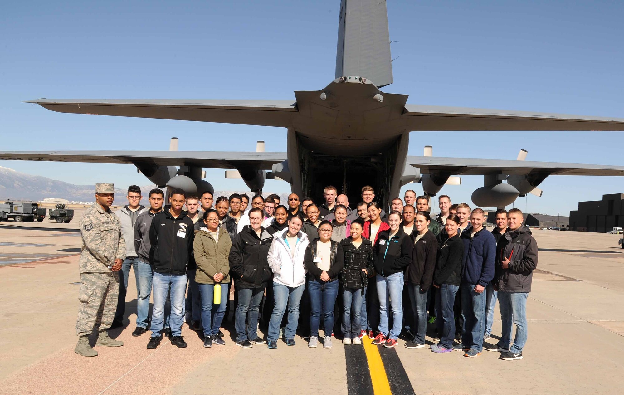 Trainees from the 302nd Airlift Wing and 310th Space Wing Development and Training Flight took part in a C-130 Hercules aircraft tour, Apr. 2, 2017, at Peterson Air Force Base, Colo. The purpose of D&TF is to prepare trainees for basic training, technical school, and an Air Force Reserve career. “The goal is to get our trainees on a C-130 Hercules tour every four months,” said Tech. Sgt. Jemario Patterson, 302nd AW D&TF program coordinator. “We tour other 302nd AW squadrons so trainees can learn the mission of each unit and see reservists in action.” (U.S. Air Force photo/Staff Sgt. Amber Sorsek)
