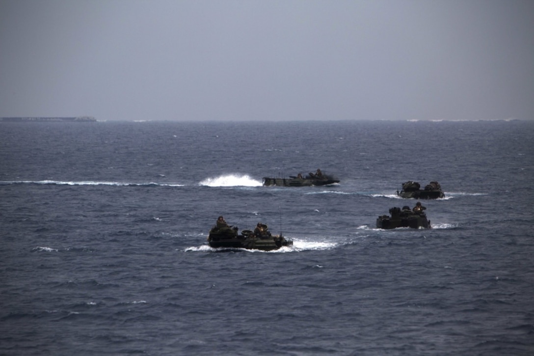Marines with Battalion Landing Team, 2nd Battalion, 5th Marines, maneuver off the coast of Okinawa, Japan, March 8, 2017. AAVs maneuvered into the well deck of USS Ashland (LSD 48) as part of the 31st MEU's regularly scheduled spring patrol aboard ships of the Bonhomme Richard Amphibious Ready Group. As the Marine Corps’ only continuously forward deployed unit, the 31st MEU’s air-ground-logistics team provides a flexible force, ready to perform a wide range of military operations, from limited combat to humanitarian assistance operations, throughout the Indo-Asia-Pacific region. (U.S. Marine Corps photo by Lance Cpl. Breanna L. Weisenberger) 