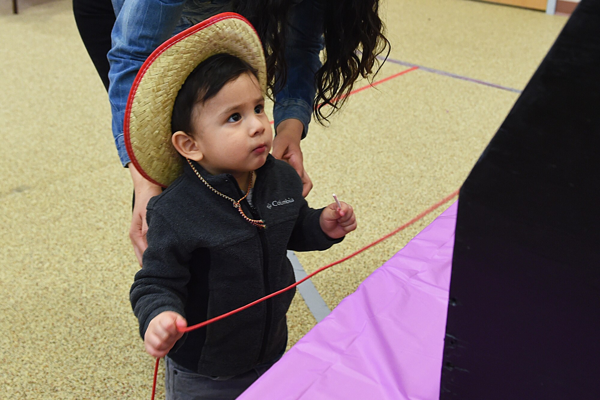 Sebastian Zepeda, 1, participates in a game at the Month of the Military Child Kick-Off Celebration at the Illa School Age Center at Joint Base Elmendorf-Richardson, Alaska, March 31, 2017. The Month of the Military Child honors the important role military children play in the armed forces community. 