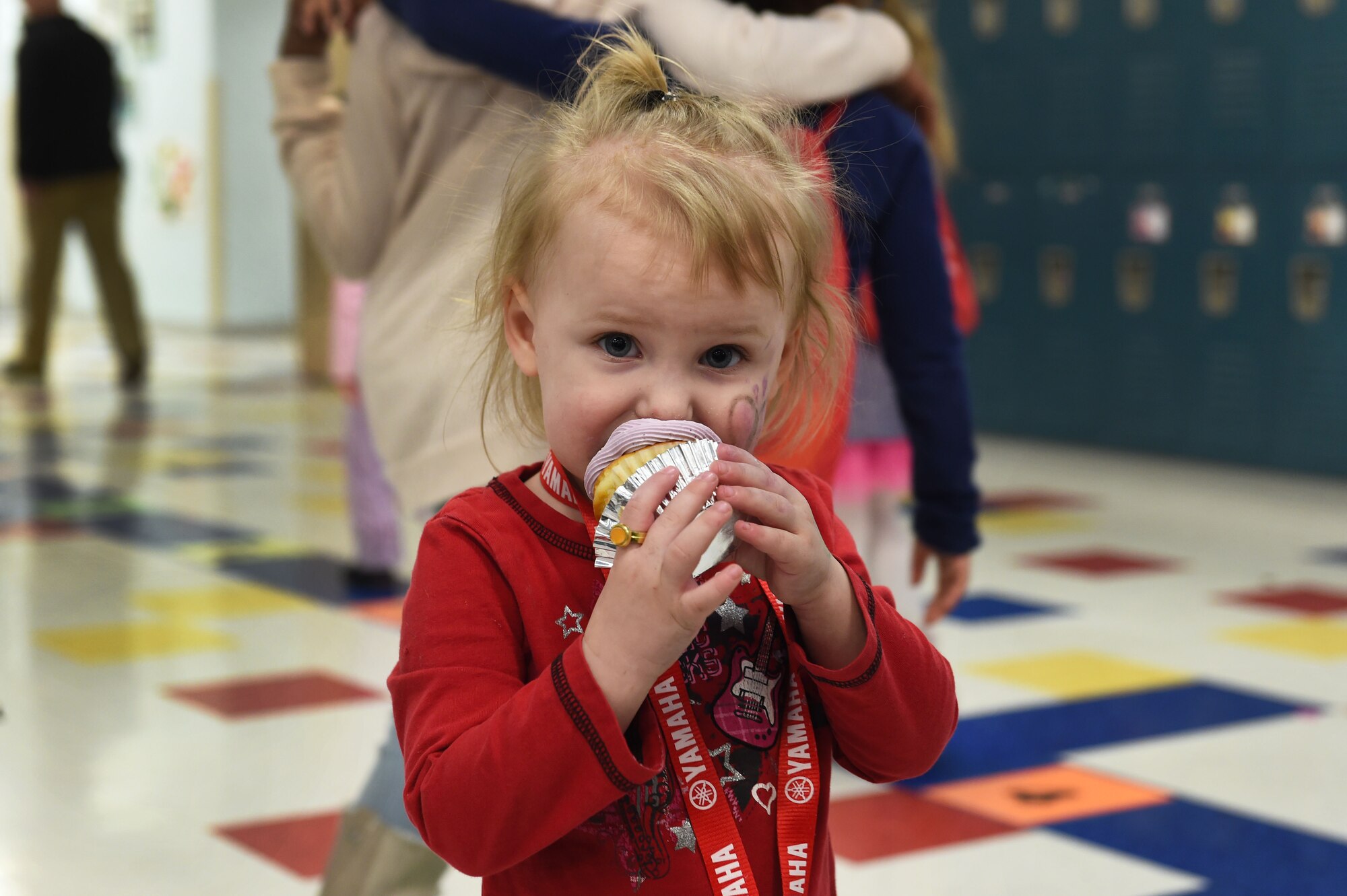 Chloe Collins, 2, enjoys a cupcake at the Month of the Military Child Kick-Off Celebration at the Illa School Age Center at Joint Base Elmendorf-Richardson, Alaska, March 31, 2017. The Month of the Military Child honors the important role military children play in the armed forces community. 