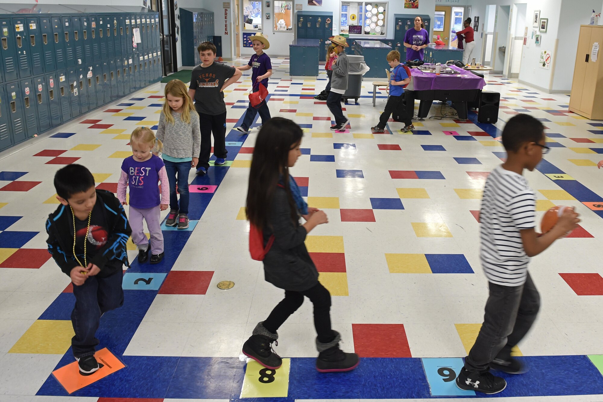 Children participate in a cupcake-walk at the Month of the Military Child Kick-Off Celebration at the Illa School Age Center at Joint Base Elmendorf-Richardson, Alaska, March 31, 2017. The Month of the Military Child honors the important role military children play in the armed forces community.