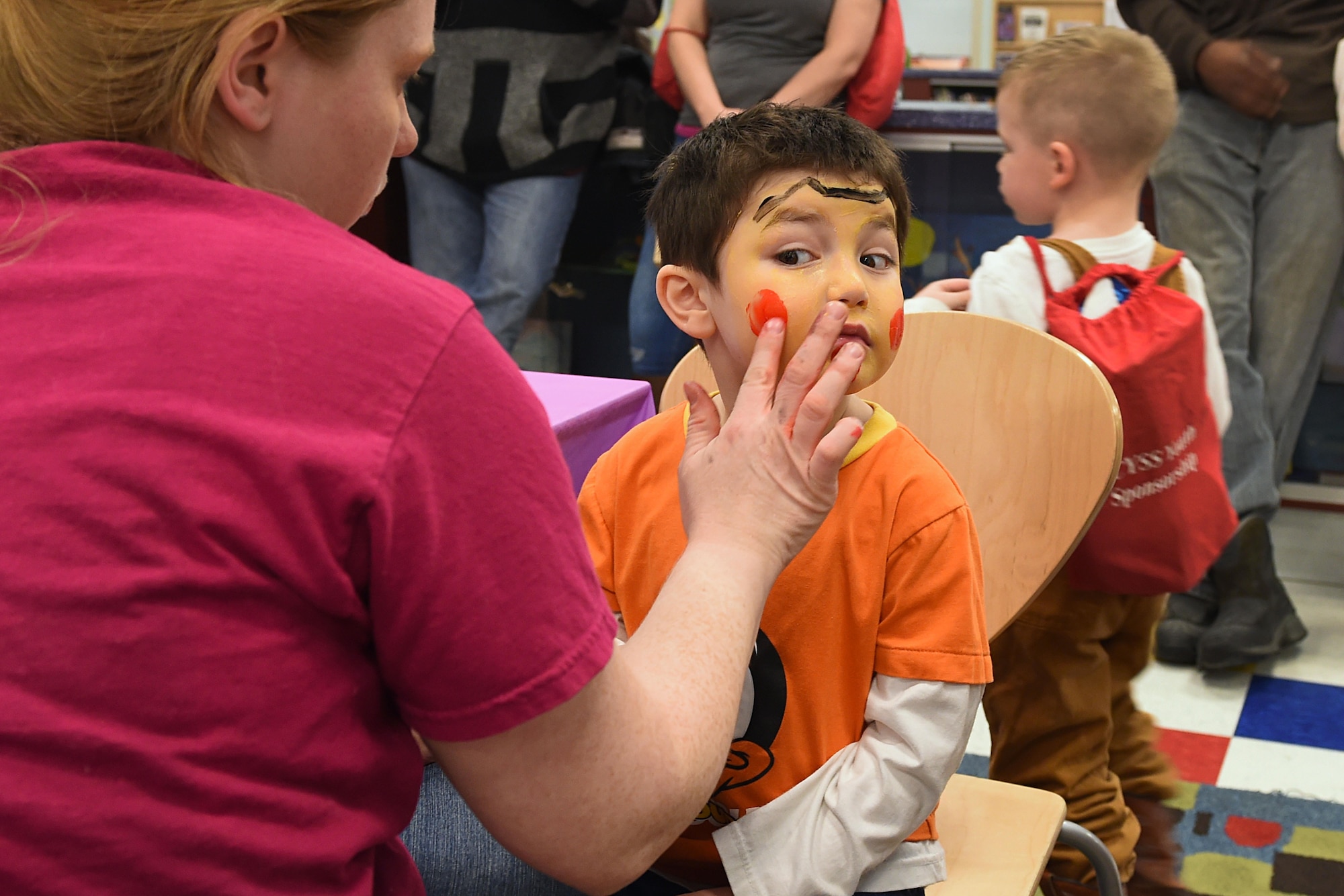 Logan Haines, 4, receives a face painting at the Month of the Military Child Kick-Off Celebration at the Illa School Age Center at Joint Base Elmendorf-Richardson, Alaska, March 31, 2017. The Month of the Military Child honors the important role military children play in the armed forces community. 