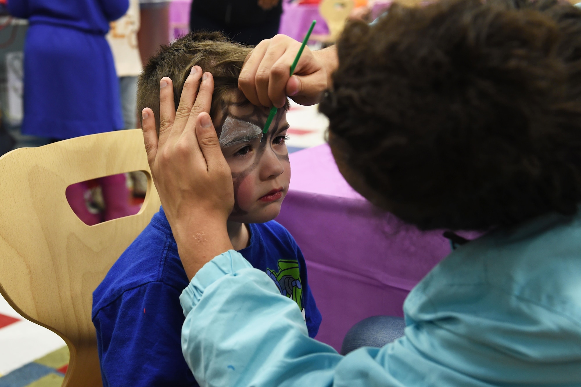 Connor Berner, 3, receives a face painting at the Month of the Military Child Kick-Off Celebration at the Illa School Age Center at Joint Base Elmendorf-Richardson, Alaska, March 31, 2017. The Month of the Military Child honors the important role military children play in the armed forces community. 