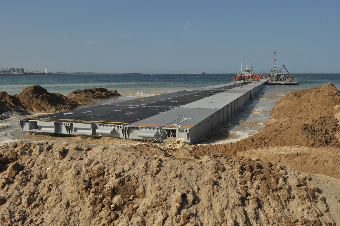 The first section of the 331st Transportation Company’s Trident Pier eases into position along Dogu Beach near the South Korean port city of Pohang, April 7, 2017 in preparation of Operation Pacific Reach Exercise 2017. The pier will serve as a disembarkation point for ship-to-shore operations during the combined Republic of Korea – U.S. exercise. Also known as OPRex17, the exercise is a bilateral training event designed to ensure readiness and sustain the capabilities which strengthen the ROK-U.S. alliance. 