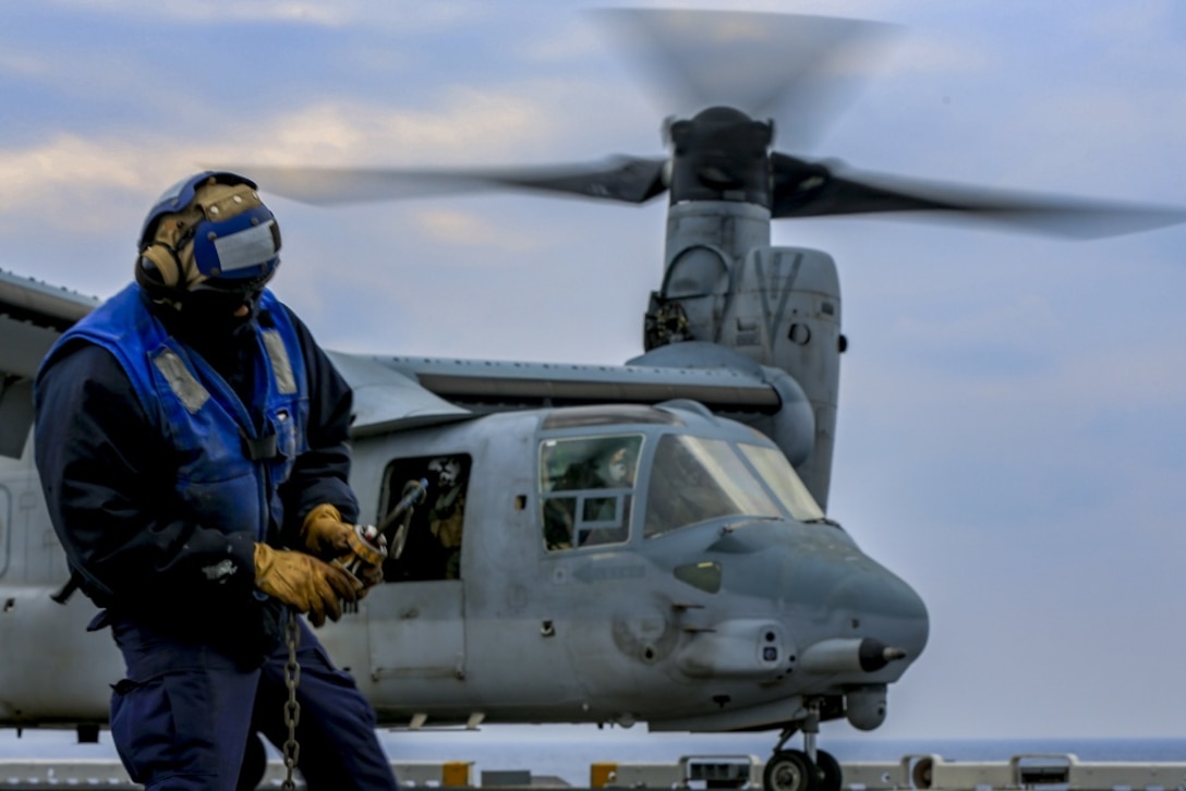 An MV-22B Osprey with Marine Medium Tiltrotor 262 (Reinforced), 31st Marine Expeditionary Unit starts propellers during flight operations in the Pacific Ocean aboard the USS Bonhomme Richard (LHD 6), March 9, 2017. Marines and Sailors of the 31st MEU embarked aboard the USS Bonhomme Richard (LHD 6), part of the Bonhomme Richard Amphibious Readiness Group, as part of their annual spring patrol of the Indo-Asia-Pacific region. The 31st MEU, embarked on the amphibious ships of the Expeditionary Strike Group 7, has the capability to respond to any crisis or contingency at a moment’s notice. (U.S. Marine Corps photo by Cpl. Jona R. Meme)