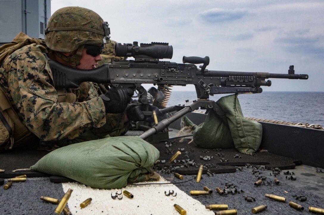 Lance Cpl. Dakota Patterson, a machine gunner with Echo Co., Battalion Landing Team, 2nd Battalion, 5th Marines, 31st Marine Expeditionary Unit, fires an M240G medium machine gun during a Defense Amphibious Task Force drill on the flight deck of USS Ashland (LSD 48), in the Pacific Ocean, March 10, 2017. The DATF integrates Marine Corps and Navy firepower into a joint defense of the naval ship. As the Marine Corps' only continuously forward-deployed unit, the 31st MEU air-ground-logistics team provides a flexible force, ready to perform a wide range of military operations, from limited combat to humanitarian assistance operations, throughout the Indo-Asia Pacific region. (U.S. Marine Corps photo by Cpl. Darien J. Bjorndal)