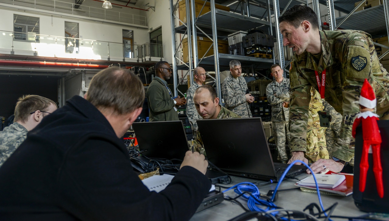 U.S. Army Staff Sgt. Matthew Malesinski, right, 201st Cyber Protection Team network security analyst, talks with his team during a cyber security audit of the 1st Combat Communications Squadron’s tactical communications kits March 16, 2017, on Ramstein Air Base, Germany. The 1st CBCS requested the 201st CPT, which is part of the U.S. Army Cyber Protection Brigade, to test both the physical and internal security of their systems that allow them to set up and manage secure communications at deployed locations. (U.S. Air Force photo/Staff Sgt. Timothy Moore)