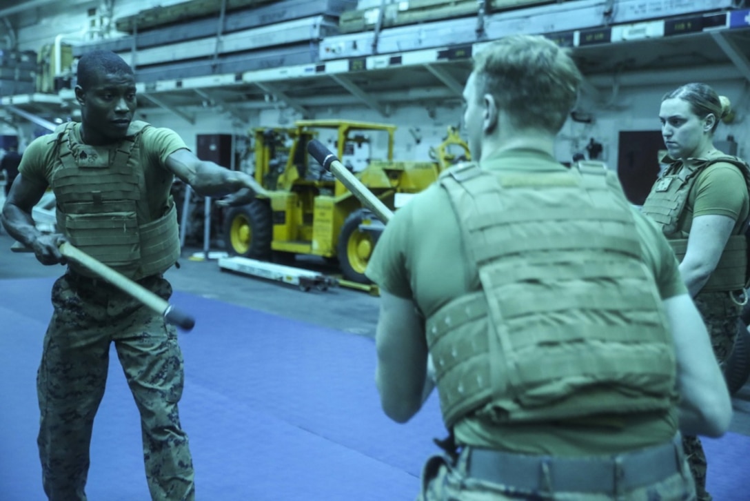 Sgt. Isaih Hart (left), a radio operator with Command Element, 31st Marine Expeditionary Unit, demonstrates bayonet techniques during Marine Corps Martial Arts Program training aboard the USS Bonhomme Richard (LHD 6) ), in the Pacific Ocean, March 12, 2017. Marines from each element of the 31st MEU underwent MCMAP training during the 31st MEU’s 17.1 Spring Patrol of the Asia-Pacific region. As the Marine Corps’ only continuously forward deployed unit, the 31st Marine Expeditionary Unit’s air-ground-logistics team provides a flexible force, ready to perform a wide range of military operations, from limited combat to humanitarian assistance operations, throughout the Asia-Pacific region. (U.S. Marine Corps photo by Sgt. Tiffany Edwards/Released)