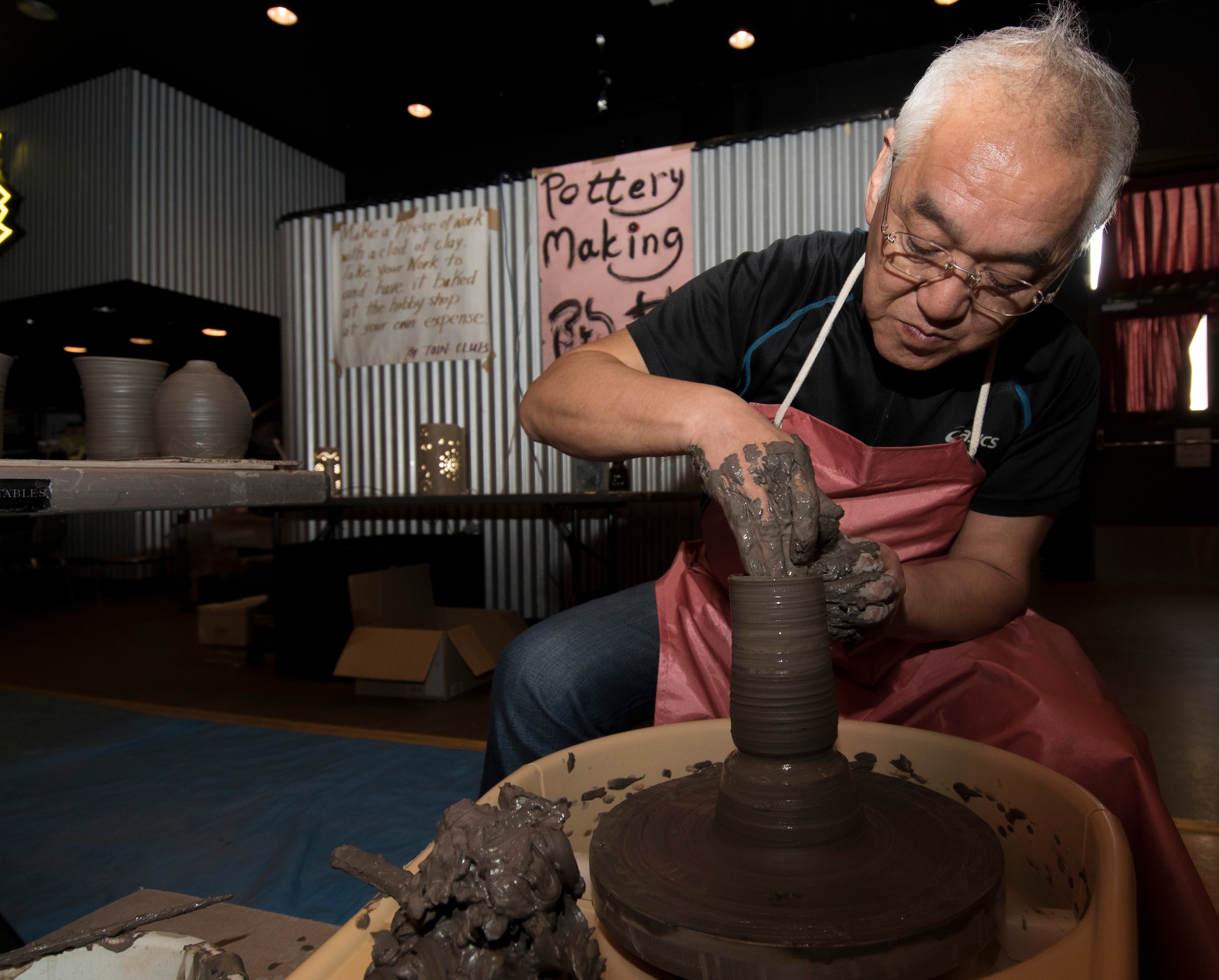 Hide Chika, an Aomori potter, creates a ceramic cup during the 30th Annual Japan Day at Misawa Air Base, Japan, April 8, 2017. Along with pottery, attendees partook in creating Japanese kites, embroidery and origami crafts with the local community. (U.S. Air Force photo by Airman 1st Class Sadie Colbert)