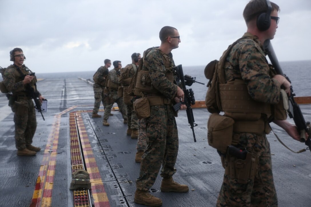 U.S. Marines with Combat Logistics Battalion (CLB) 31, 31st Marine Expeditionary Unit (MEU) conduct marksmanship training during a deck shoot aboard the USS Bonhomme Richard (LHD 6), in the Pacific Ocean, March 14, 2017. Marines with CLB-31, 31st MEU underwent combat marksmanship training as a part of the 31st MEU’s 17.1 Spring Patrol of the Asia-Pacific region. As the Marine Corps’ only continuously forward deployed unit, the 31st MEU’s air-ground-logistics team provides a flexible force, ready to perform a wide range of military operations, from limited combat to humanitarian assistance operations, throughout the Asia-Pacific region. (U.S. Marine Corps photo by Sgt. Tiffany Edwards) 