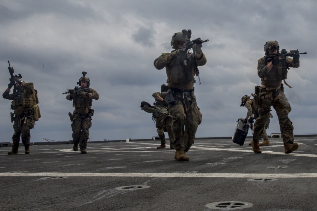 Force Reconnaissance Marines with the Maritime Raid Force, 31st Marine Expeditionary Unit, move to the objective during a vessel Visit, Board, Search and Seizure exercise aboard the USNS Richard E. Byrd (T-AKE-4) in the Pacific Ocean, March 17, 2017. The MRF specializes in ground and amphibious reconnaissance operations and limited scale raids as the primary reconnaissance and battlespace shaping element of the 31st MEU. 31st MEU conducts VBSS training as a part of the 31st MEU’s 17.1 Spring Patrol of the Asia-Pacific region. As the Marine Corps’ only continuously forward deployed unit, the 31st MEU’s air-ground-logistics team provides a flexible force, ready to perform a wide range of military operations, from limited combat to humanitarian assistance operations, throughout the Asia-Pacific region. (U.S. Marine Corps photo by Cpl. Jona R. Meme/Released)