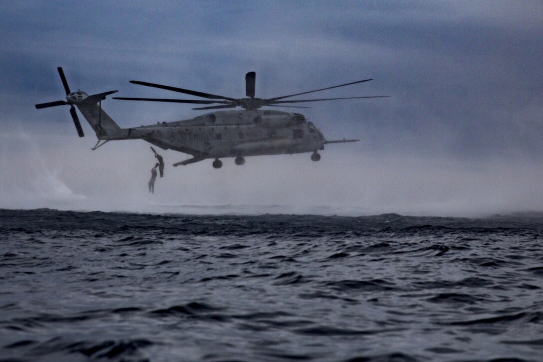 A CH-53E Super Stallion belonging to Marine Attack Squadron 311, 31st Marine Expeditionary Unit, releases reconnaissance Marines during a helo-casting exercise in the Pacific Ocean, March 19, 2017. Helo-casting is a method for inserting reconnaissance and surveillance teams in support of small boat operations. The Amphibious Reconnaissance Platoon specializes in ground and amphibious reconnaissance operations as the primary reconnaissance and surveillance element of the 31st MEU. 31st MEU conducted helo-cast training as a part of their 17.1 Spring Patrol of the Asia-Pacific region. As the Marine Corps’ only continuously forward deployed unit, the 31st MEU’s air-ground-logistics team provides a flexible force, ready to perform a wide range of military operations, from limited combat to humanitarian assistance operations, throughout the Asia-Pacific region. (U.S. Marine Corps photo by Cpl. Jona R. Meme/Released) 